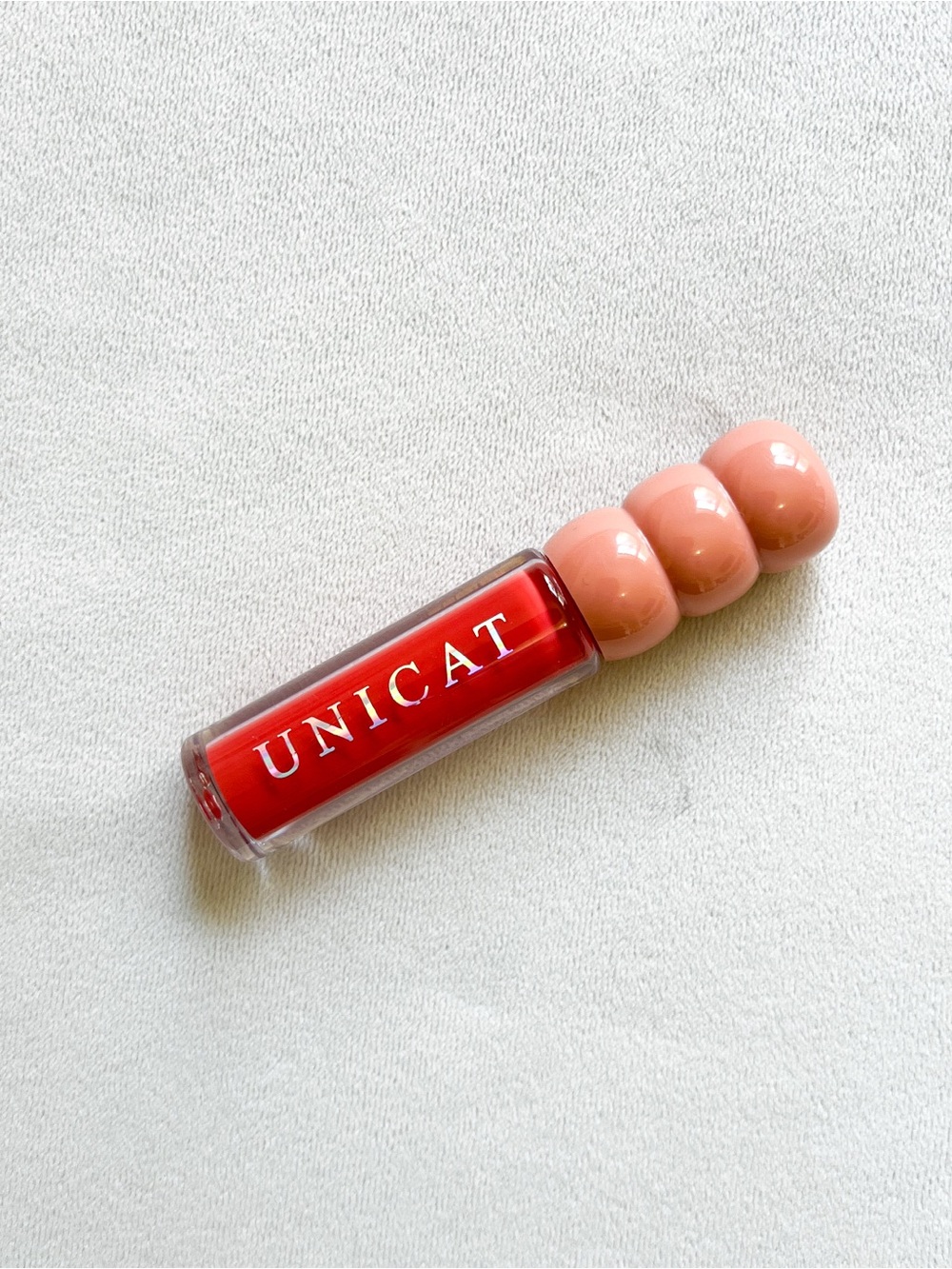 UNICAT Red Lip Gloss Tint with Peach Decorative Cap